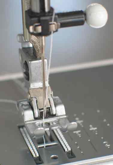 sewing machine needle plate and foot jpg
