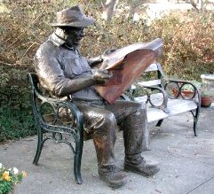 Reading the newspaper: Brookgreen Gardens in Pawleys Island, South Carolina, United States