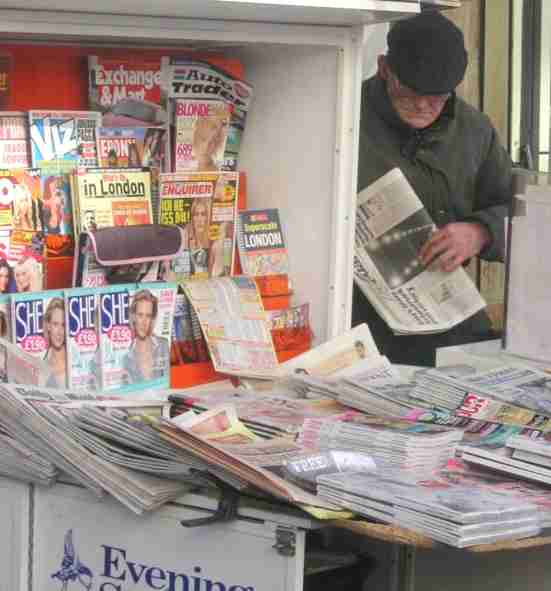 Newspaper vendor, Paddington, London, February 2005