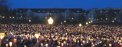 Virginia Tech students mourn their fallen friends at a candlelight vigil