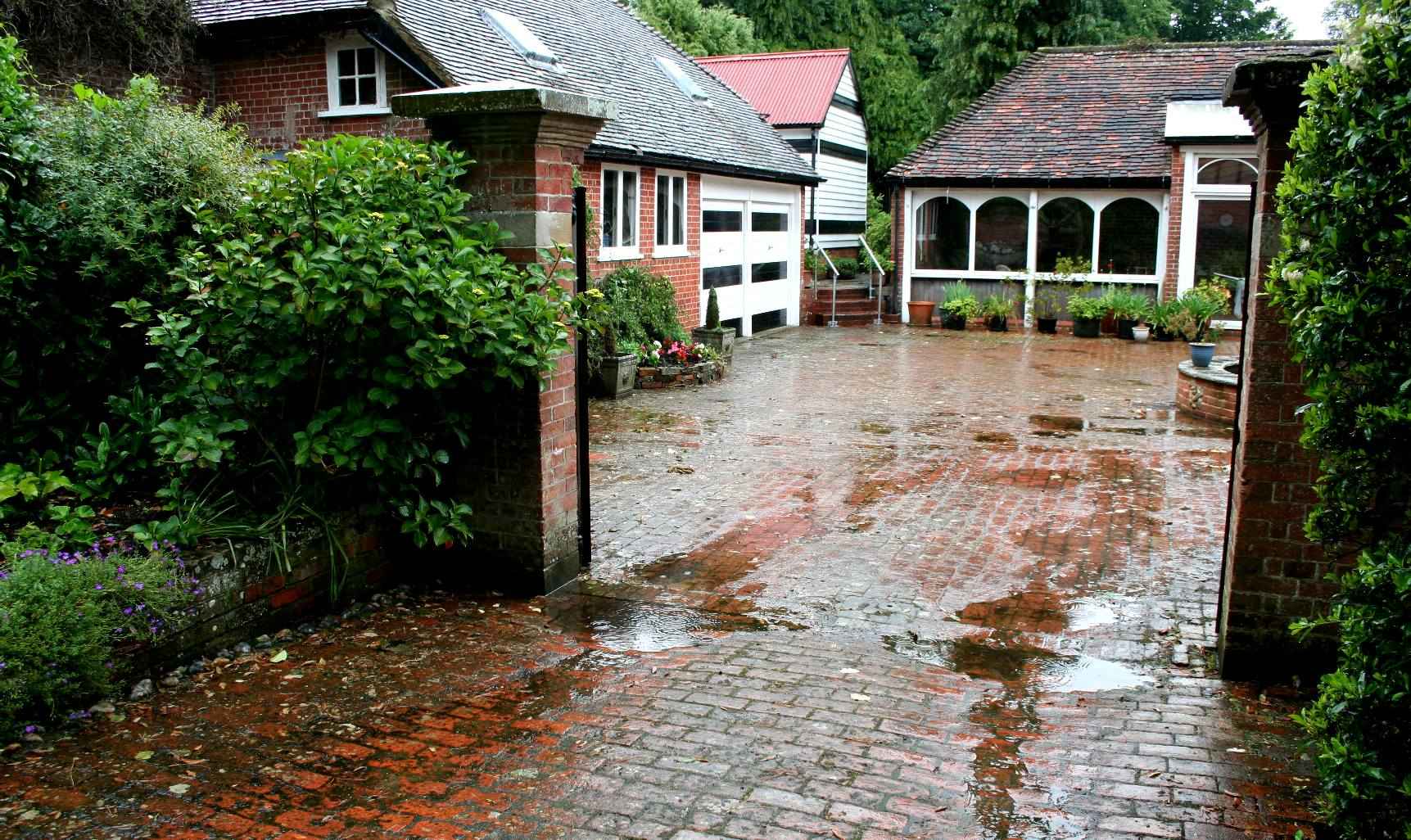 Flooding in the Old Rectory courtyard in June of 2019