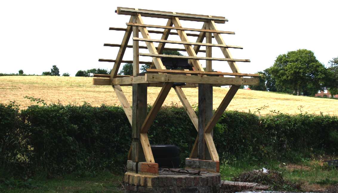 Traditional wooden well head construction